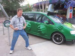 Puny Banner poses beside Hulk's Car.